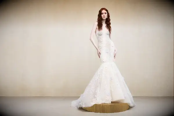 Strapless mermaid style pastel wedding dress by Ines Di Santo. 