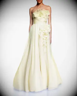 Light yellow strapless dress with floral detailing, best pastel wedding dresses. 