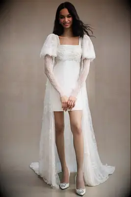 Lace bridal cape with puff sleeves