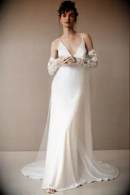 Simple wedding cape with floral lace sleeves