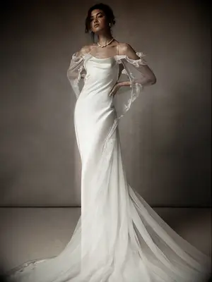 Danielle Frankel ethereal lace wedding dress with long tulle cape 
