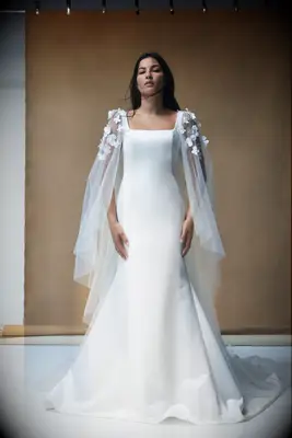 Square neck wedding gown with floral applique-adorned tulle cape