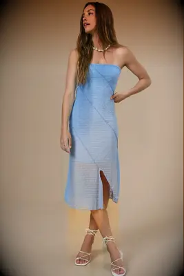 Girl wearing a blue strapless dress