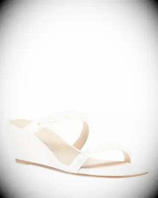 Low wedge sandals with pearl-embellished straps