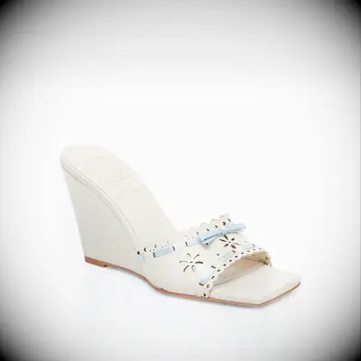 Ivory patent laser-cut wedges with blue ribbons