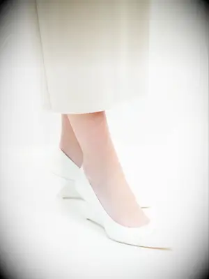 White patent wedge heel wedding pumps from Reformation
