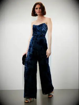 Strapless navy velvet jumpsuit for black-tie wedding