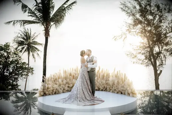 Bride and groom kissing