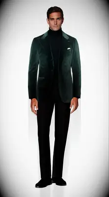 Green velvet suit jacket and black turtle neck
