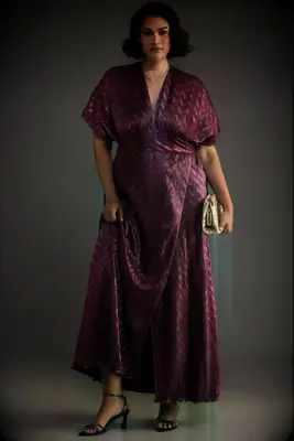 Pink short sleeve midi mother of the bride dress from Anthropologie for outdoor wedding