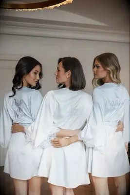 Bride and bridesmaids wearing short silk robes