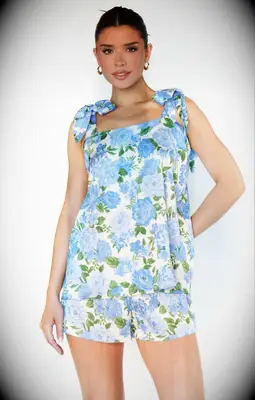Blue floral romper with shoulder ties