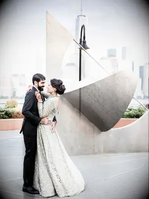 Bride wearing neutral embellished Indian wedding dress