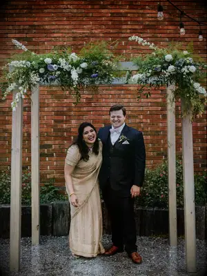 Bride wearing simple gold lehenga and saree