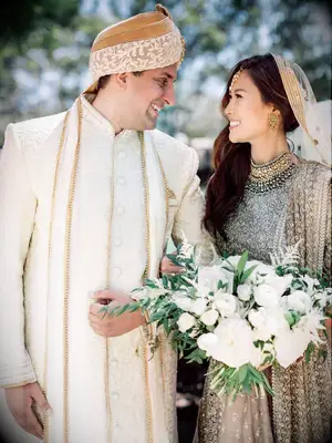 Bride wearing neutral embellished Indian wedding dress