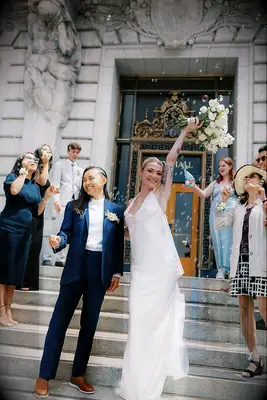Couple celebrating outside the court house