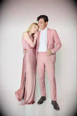 Pastel pink suit with white button up shirt