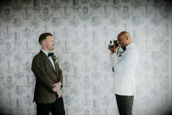 Grooms wear chic suits on their wedding day. 