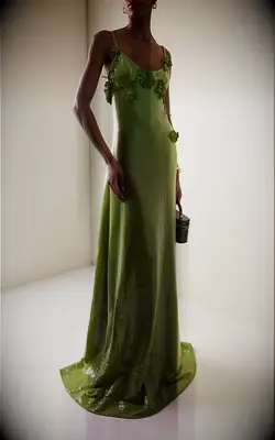 Moda Operandi green ballgown for white tie wedding guest