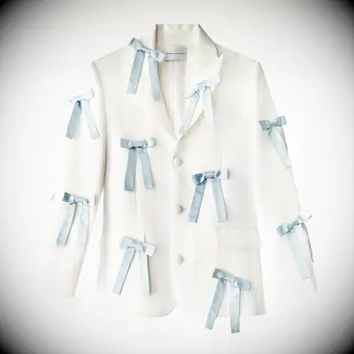Tanner Fletcher festive white blazer with pastel blue bows