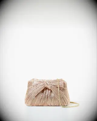 Loeffler Randall metallic bow clutch festive wedding guest accessory