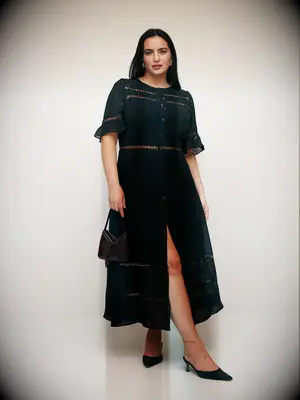 Short-sleeve black midi dress with sheer details