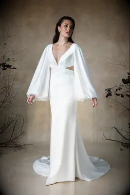 Balloon long sleeved wedding dress with wrap around bodice