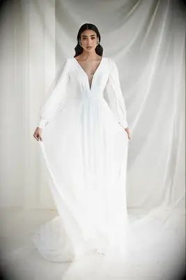 Flowy deep neck wedding dress with balloon sleeves