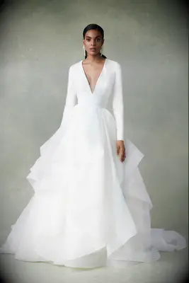 Deep v-neck wedding dress with skirt ruffles