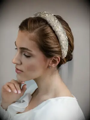 Beaded white bridal headband by Elena Honch. 