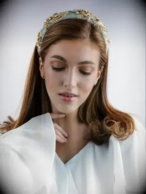 Blue bedazzled bridal headband by Elena Honch. 