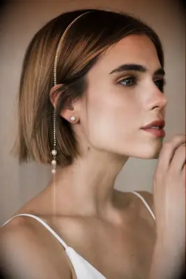 Simple tassle headband by Lelet New York. 