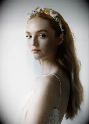 Floral bridal headband by Jennifer Behr. 