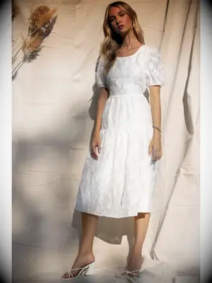 Midi wedding dress with puff sleeves and tiered skirt