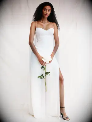 reformation white bridesmaid dress with slit and spaghetti straps