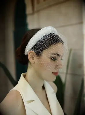 ElenoirAccessorize rhinestone headband with birdcage veil
