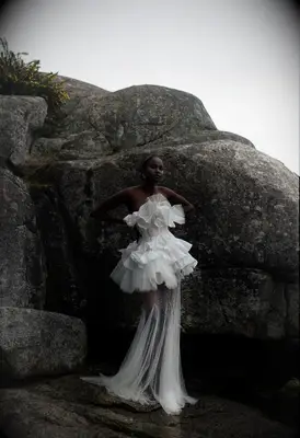 Wedding dress with sculptural elements by OUMA, wedding dress ideas