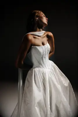 Cat eye neckline wedding dress by Hera Couture, 2026 wedding dress trend