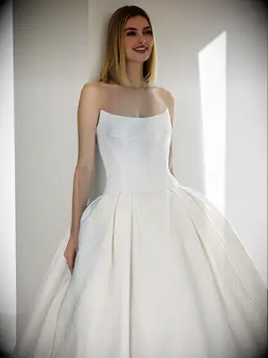 Cat eye neckline wedding dress by Pronovias, 2026 wedding dress trend