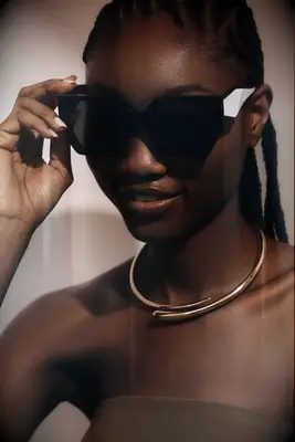 Chunky gold wrap necklace from Anthropologie for strapless wedding dress