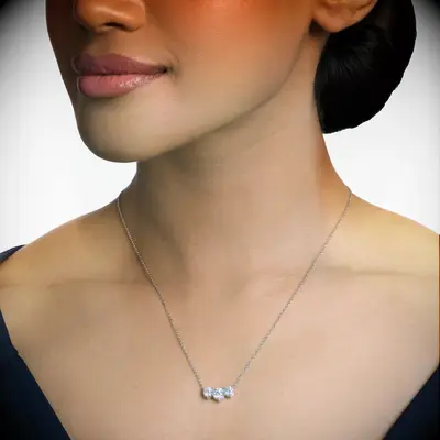 Three stone diamond necklace for strapless wedding dress from Blue Nile