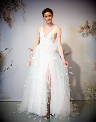 Beautiful wedding dress with bow by Badgley Mischka. 