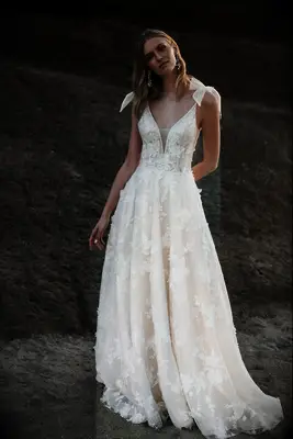 Beautiful wedding dress with bow-tied sleeves. 