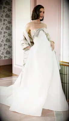 Wedding dress with a bow on the bodice by Mark Ingram Bride. 