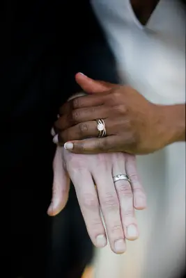 Couple showing their wedding bands