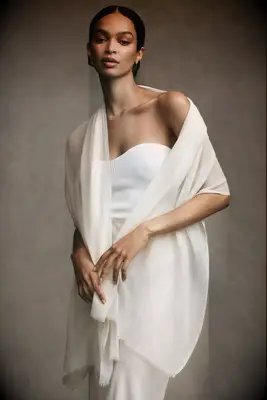 Woman wearing a sheer shoulder wrap