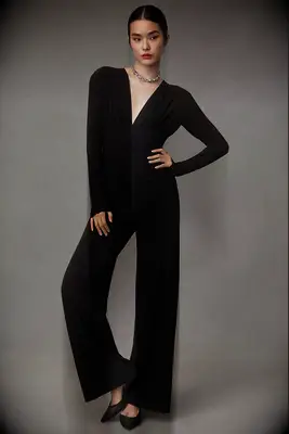 Norma Kamali black jumpsuit for tomboy wedding guest