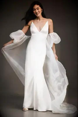 Puff sleeve off the shoulder floral embroidered bridal cape from Anthropologie