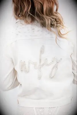 Beaded denim wedding jacket from Heirloom Bridal Company