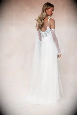 White long sleeve puff sleeve bridal cape from Lulus